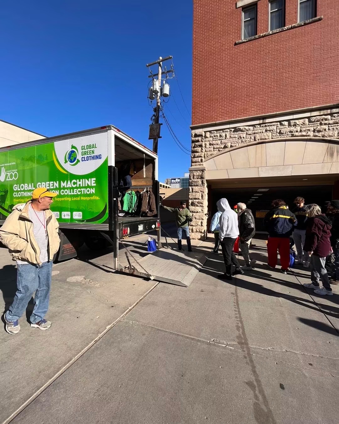 Community members lining up to donate clothing downtown