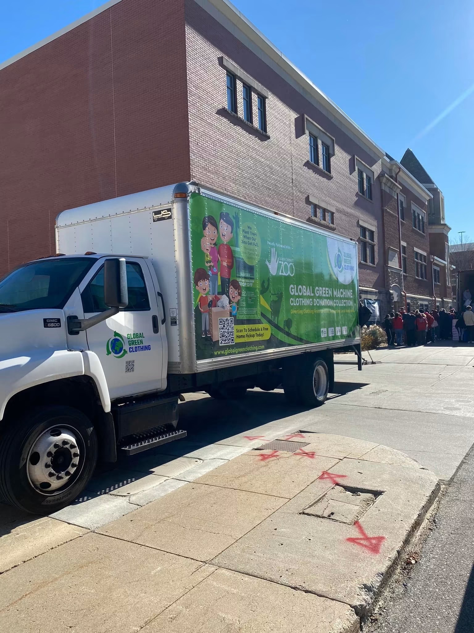 Our truck at a local school event with a crowd gathered